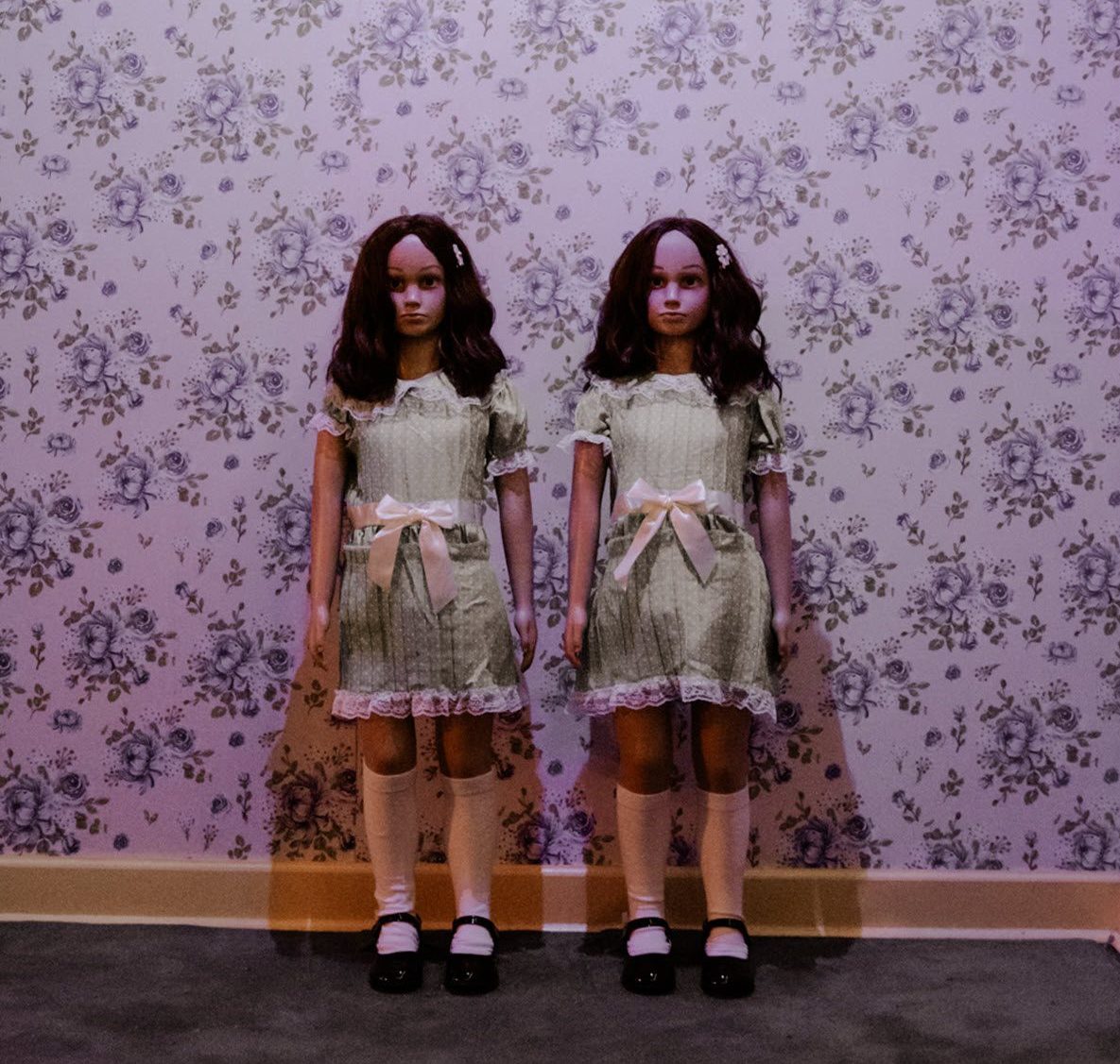 creepy dolls like the Shining twins 