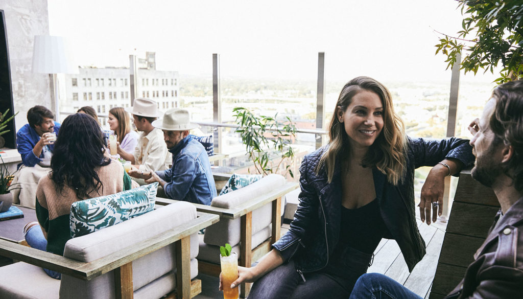 Couple having drinks on rooftop bar
