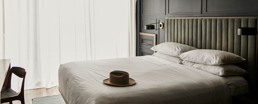 Stetson hat on a guest bed