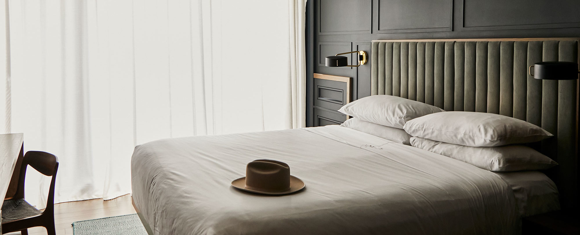 Stetson hat on a guest bed