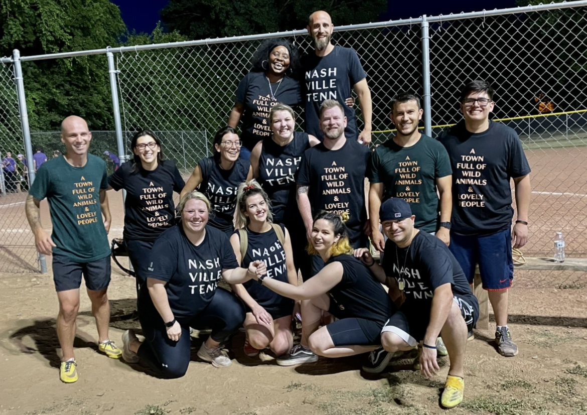 The staff and team of Noelle playing baseball